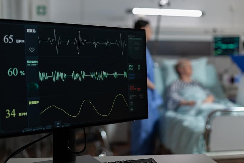 Image showing hospital ward with medical monitor displaying patient's vital signs